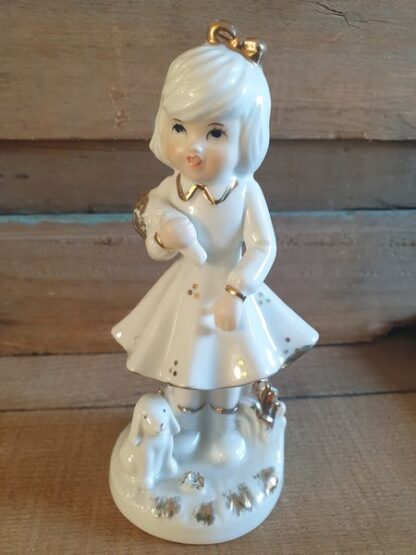 Vintage beeldje meisje met hondje