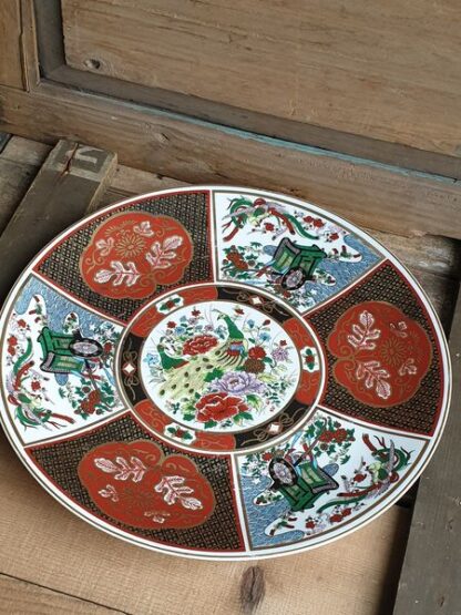 Groot Chinees bord pauw