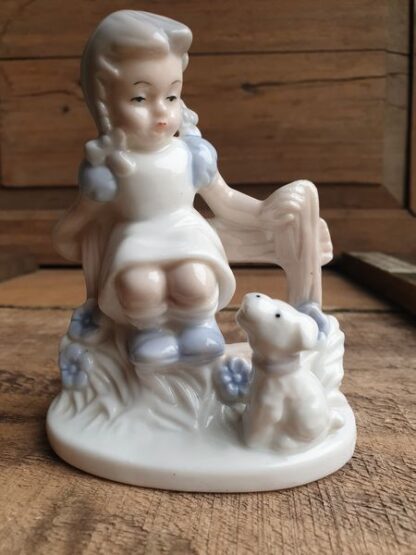 Vintage beeldje meisje met hondje